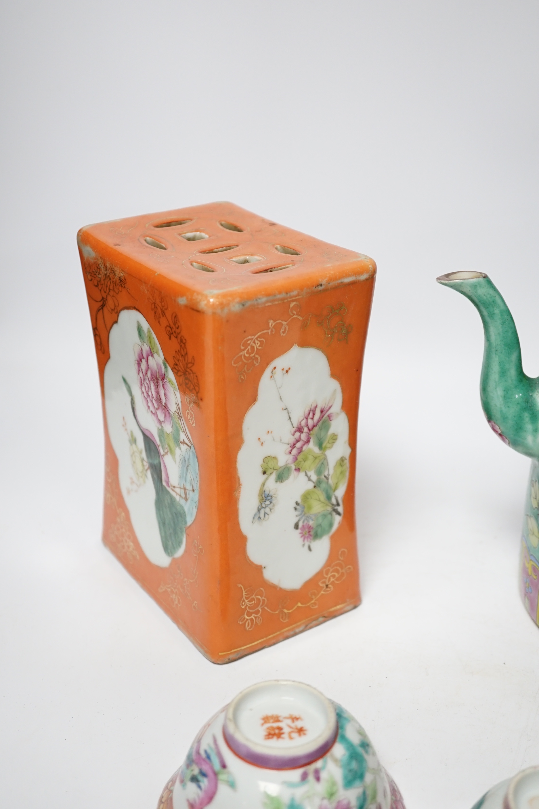 A Chinese Straits enamelled porcelain teapot and cover and seven similar tea bowls, Guangxu period and a pillow, teapot 18cm high including cover